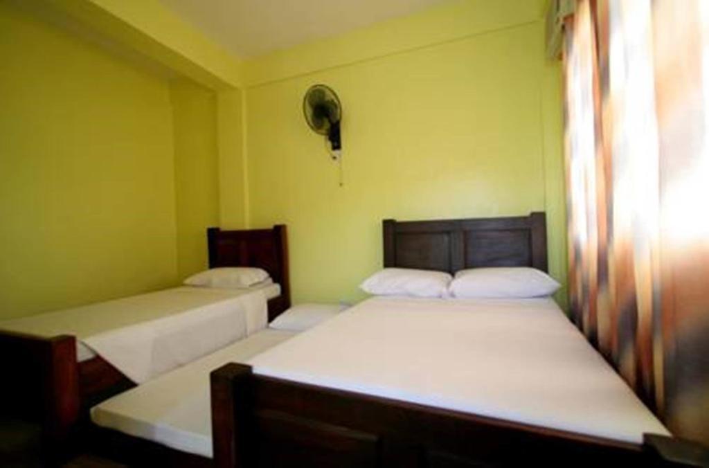 Luis Bay Travellers Lodge Корон Экстерьер фото
